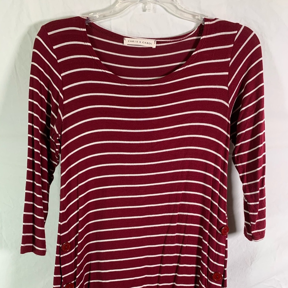 Striped shirt with buttons going up the sides